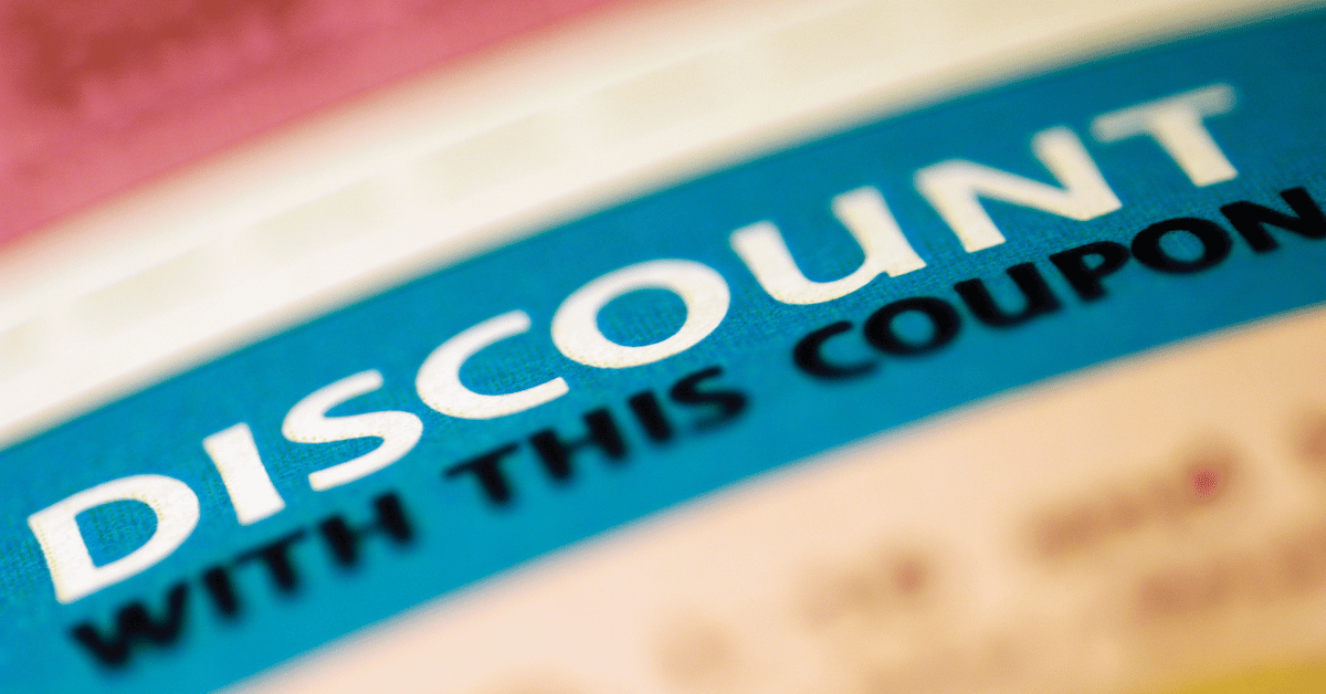 A close-up of a discount coupon, emphasizing the word "DISCOUNT" to encourage potential customers to take advantage of the offer.