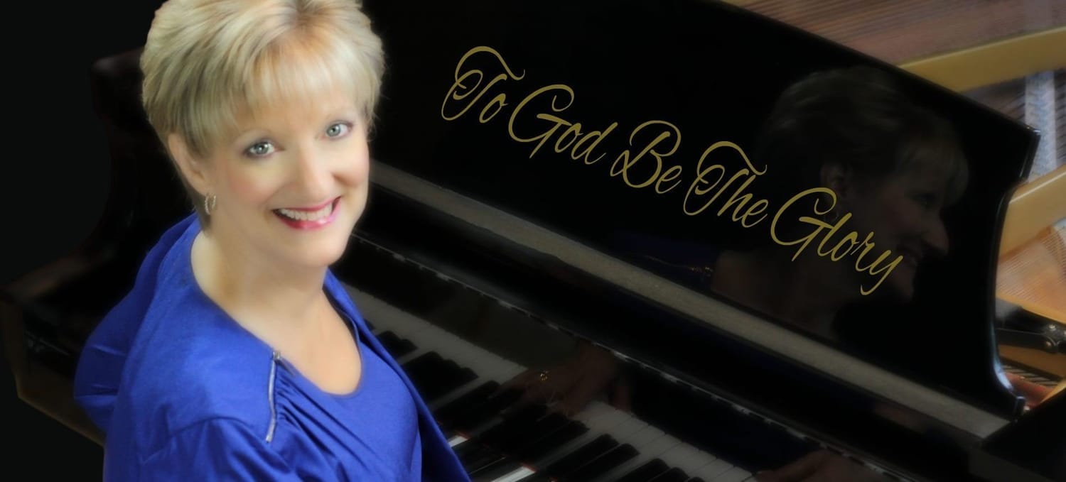 Rebecca Alderman sitting at the piano - To God Be The Glory