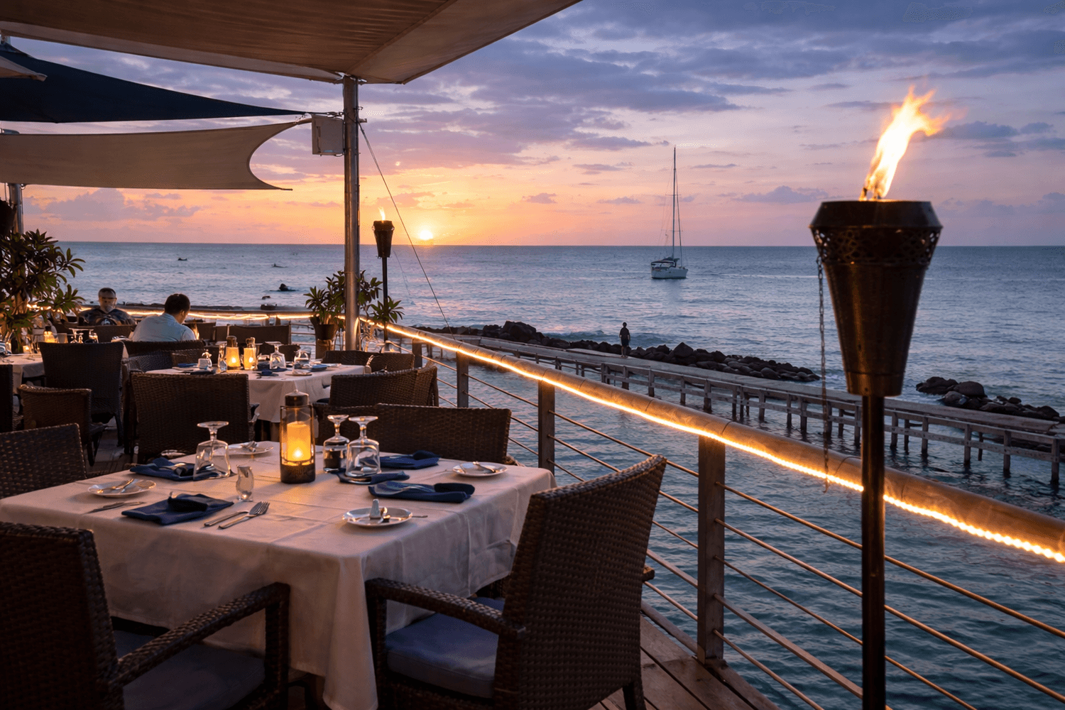outdoor patio dining at Lobster Pot restaurant Grand Cayman waterfront