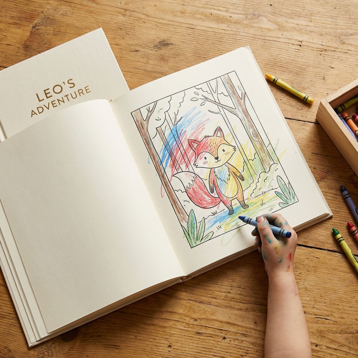 Overhead view of child actively coloring their personalized storybook