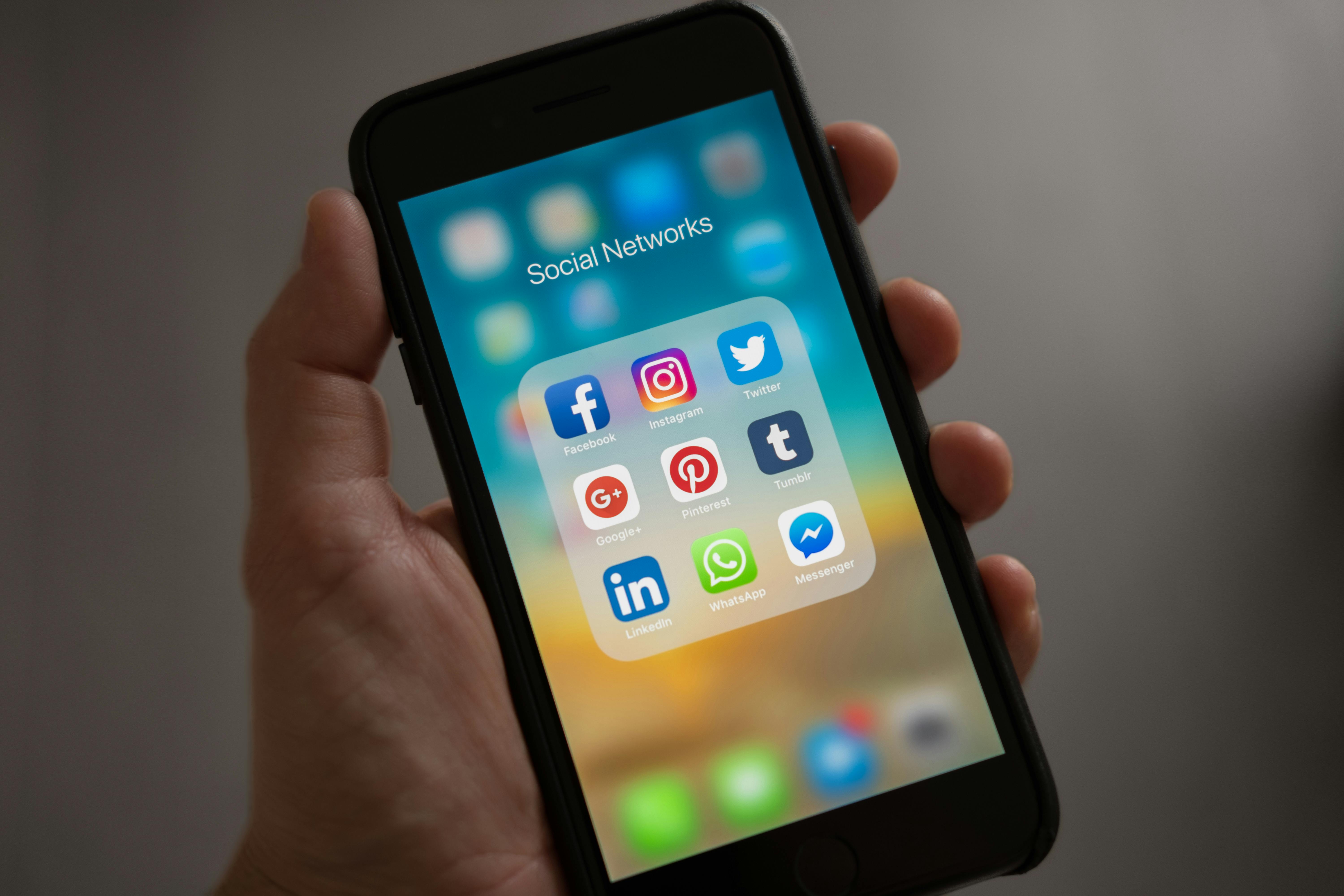 Smart phone with icons of social media platforms