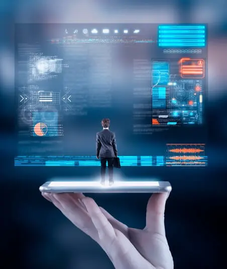 man standing in front of computer screen