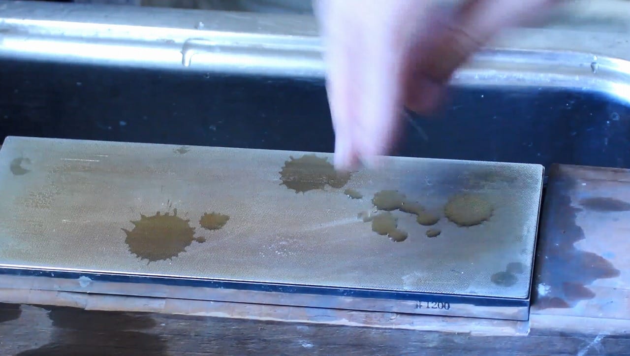 Close-up comparison of a Japanese chisel blade before and after sharpening, showing dull and polished edges