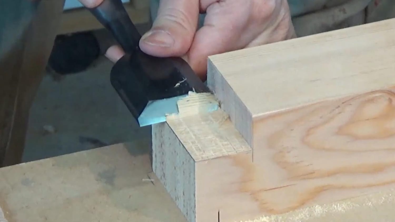 A sharp chisel cleanly penetrating wood compared with a dull chisel sliding on the surface.
