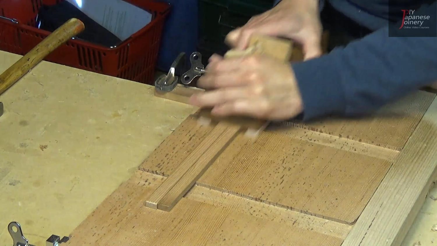 Photo showing plane being pushed slowly with thin shavings