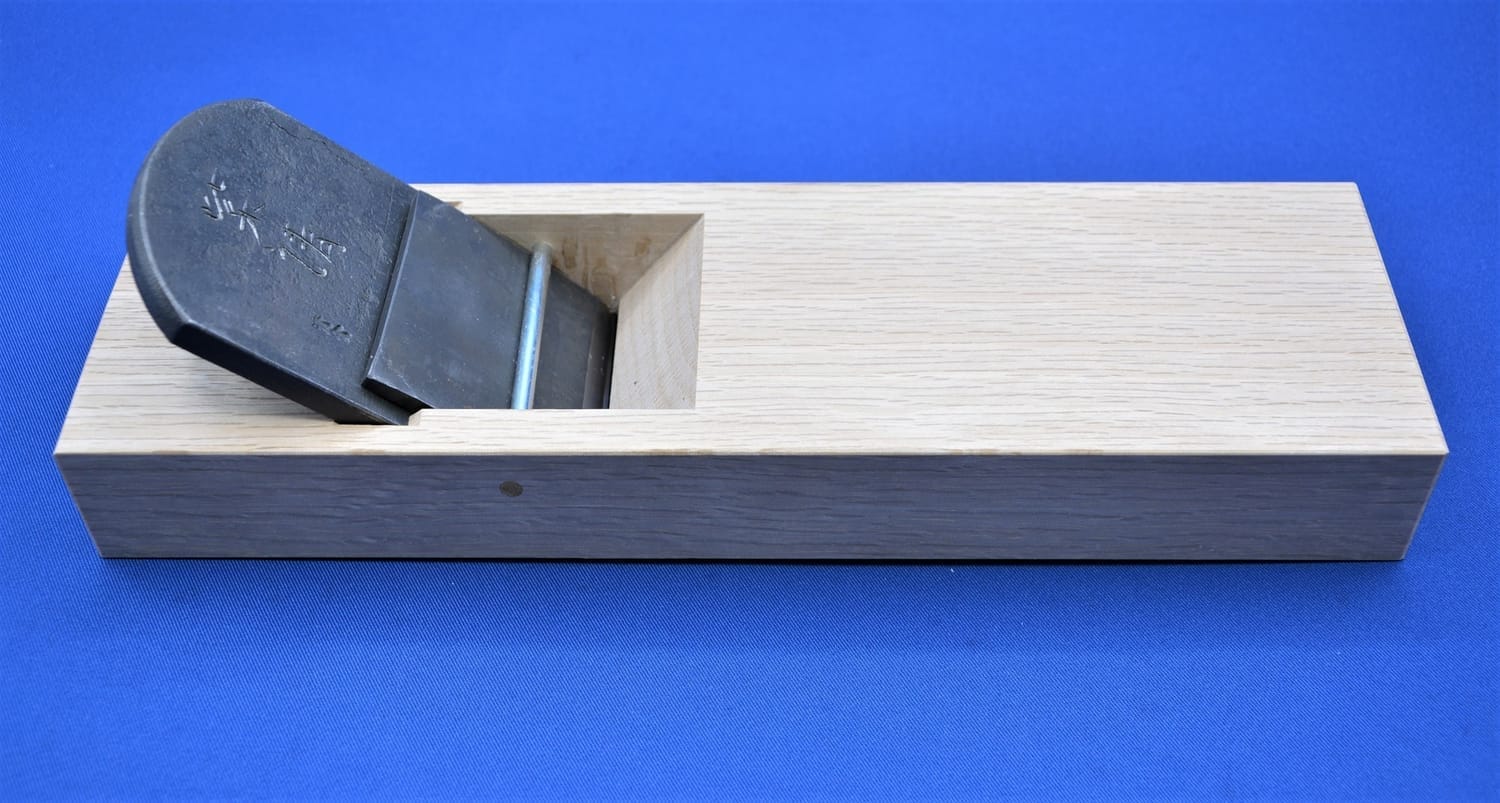 Close-up photo of a kanna (Japanese plane) blade forged from White Paper Steel.