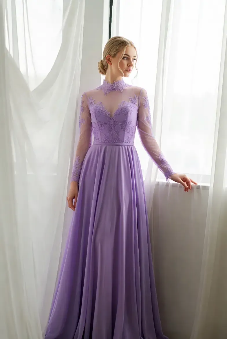 Elegant long-sleeve lavender prom dress with lace details, offering a modest and sophisticated option for Prom 2026.