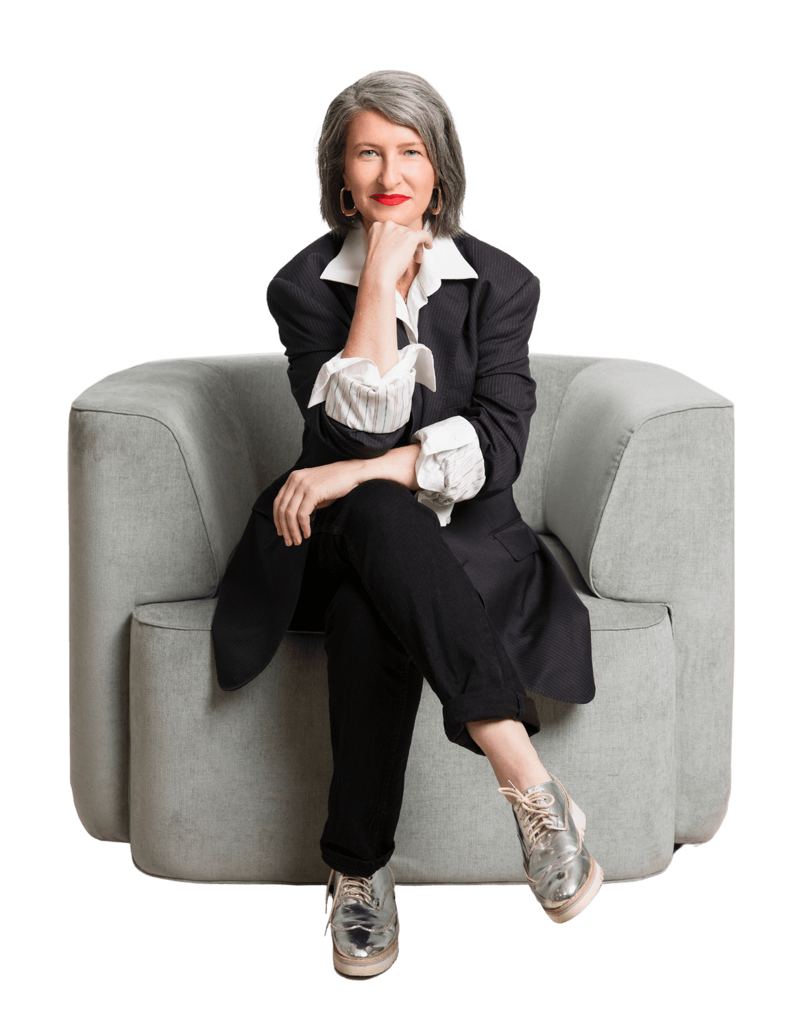 Confident formidable woman embracing her next chapter, ready to help women break free from the grind