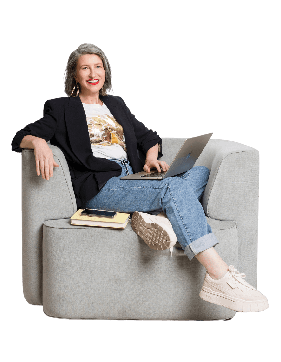 Formidable Woman in midlife confidently working on her laptop, redefining her career with purpose and freedom