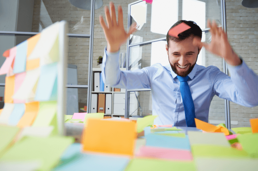 Man with chaotic sticky notes