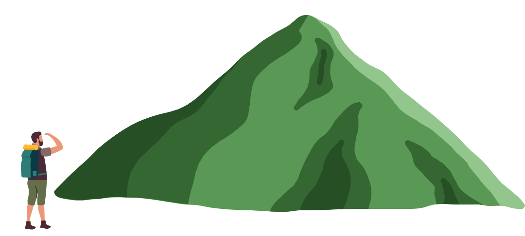 hiker at foot of mountain