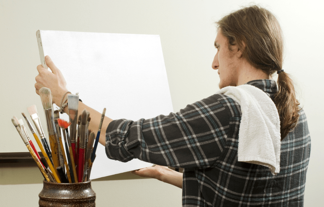 Artist with blank canvas