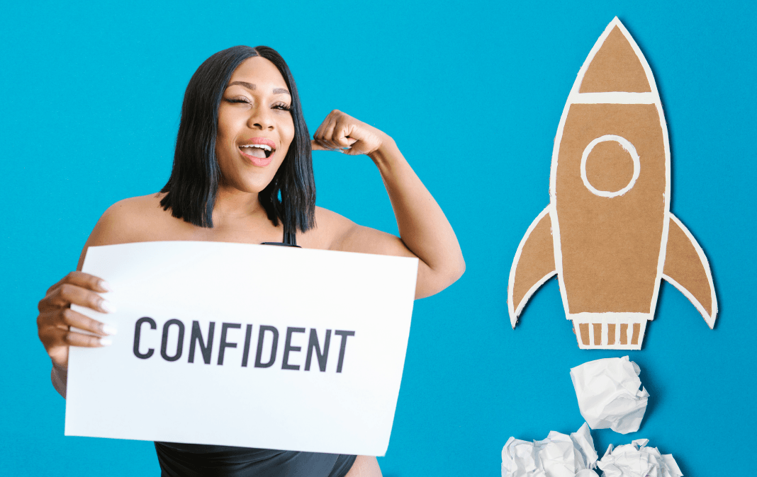 Strong, confident woman with rocket