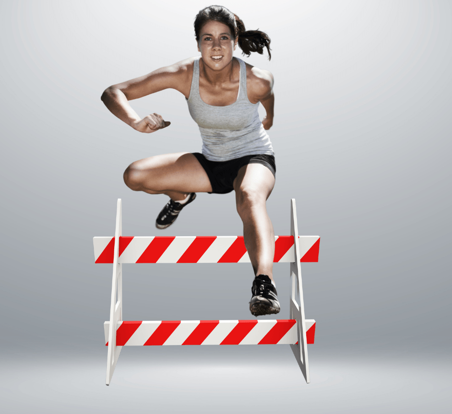 woman jumping over barriers