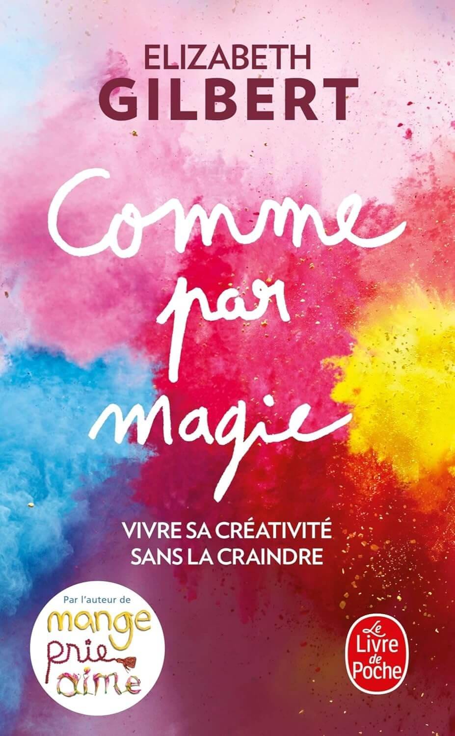 Couverture du livre « Comme par magie » d’Elizabeth Gilbert, fond aquarelle multicolore, titre manuscrit blanc, sous-titre « Vivre sa créativité sans la craindre »