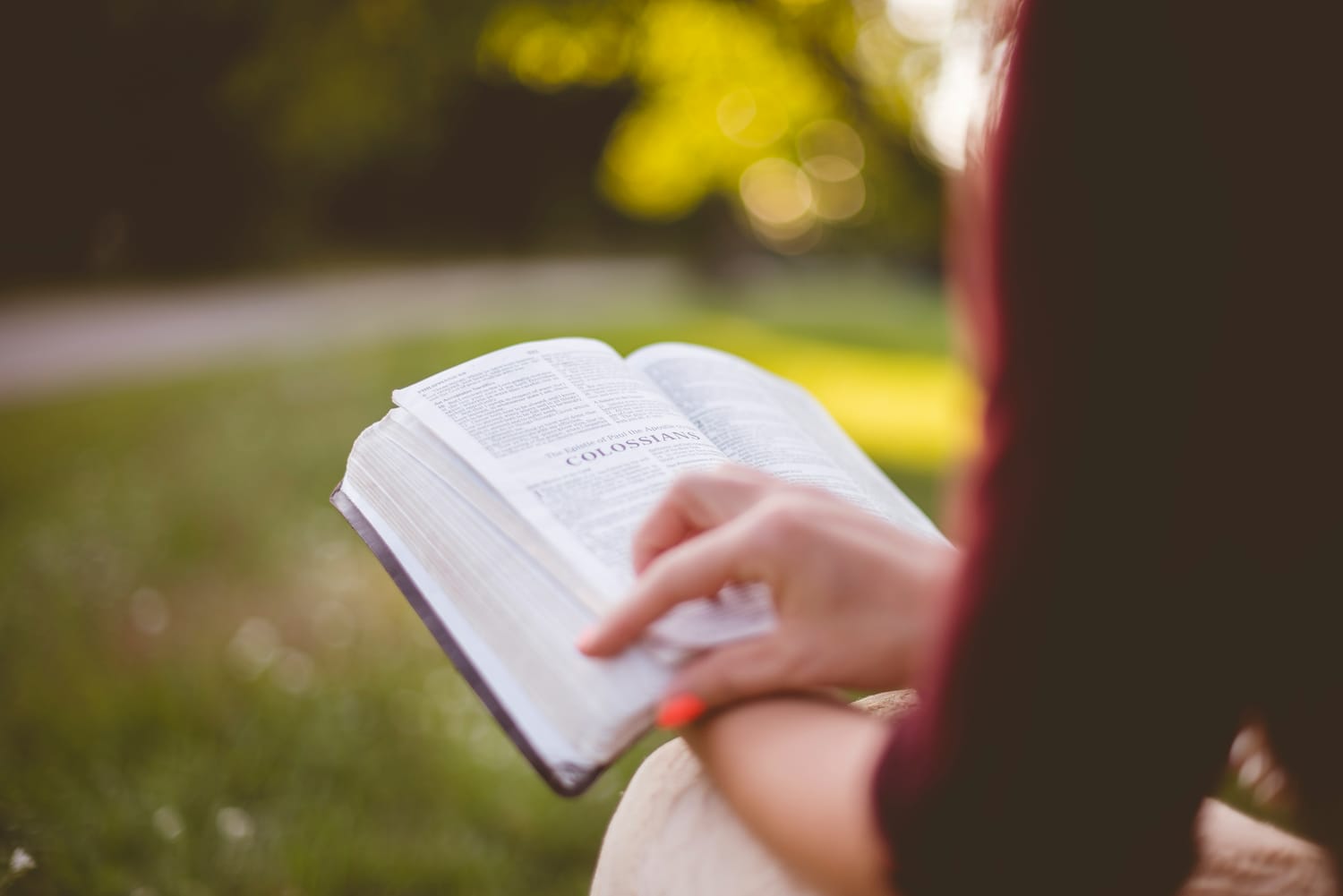 woman holding Bible