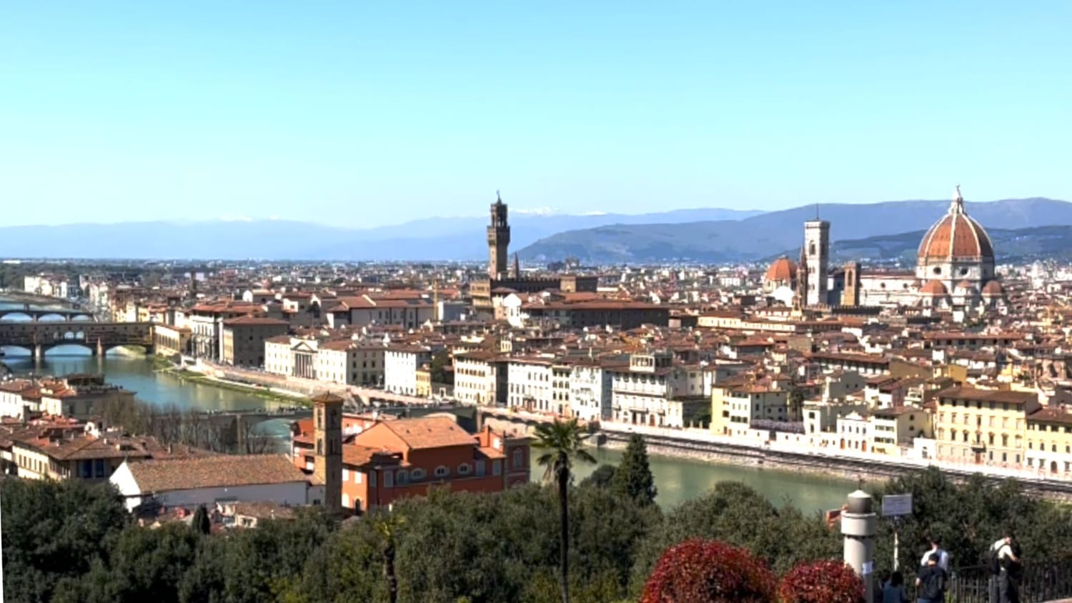 Florence from above - the Duomo and Arno river seen from Piazzale Michelangelo across the terracotta rooftops of the historic centre