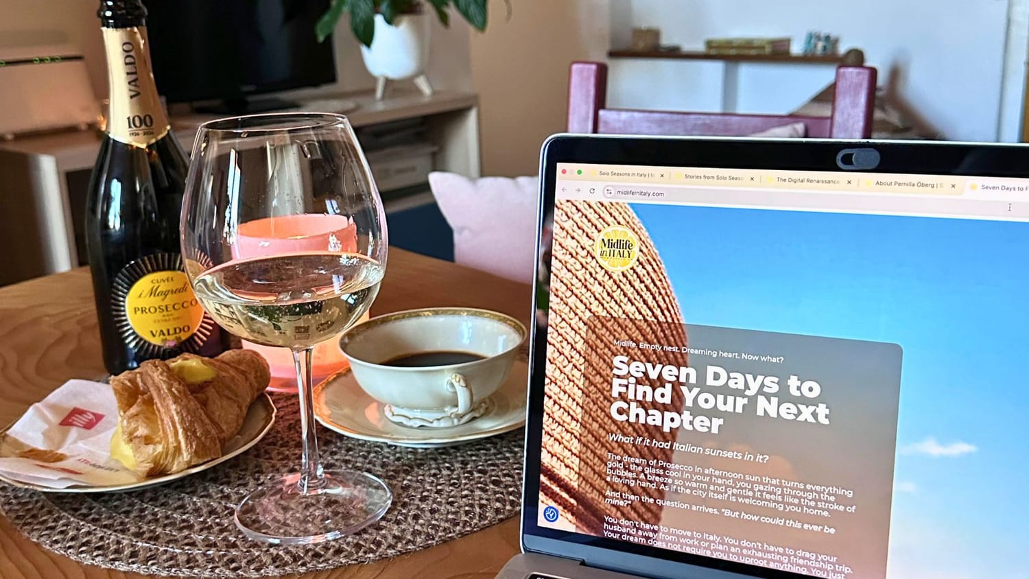 Celebrating my Handbag Office and the launch of Midlife in Italy wit a glass of Prosecco by my laptop. 