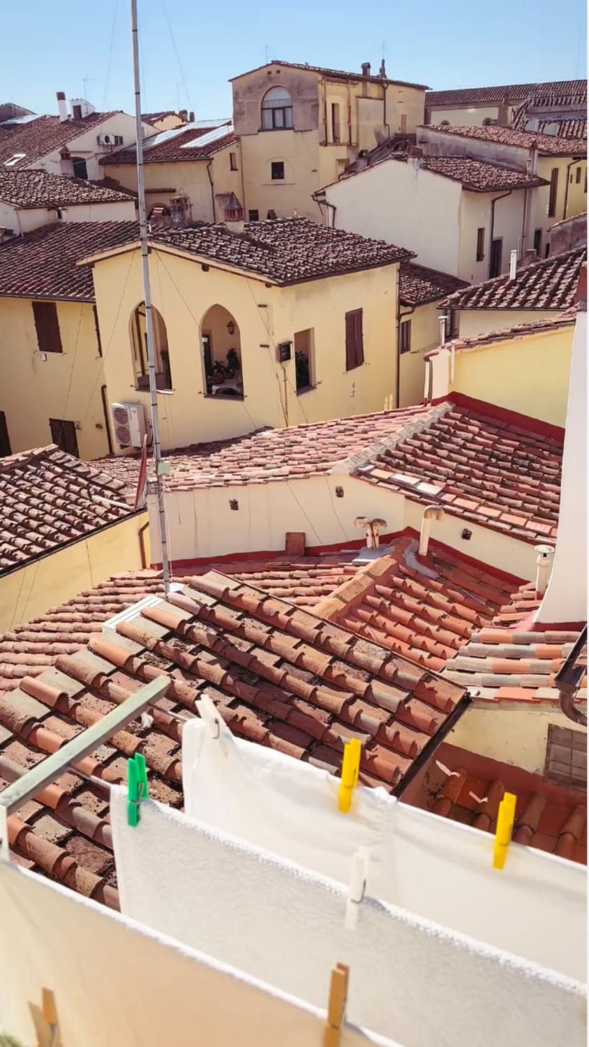 laundry drying in the spring sun among the Oltrarno rooftops