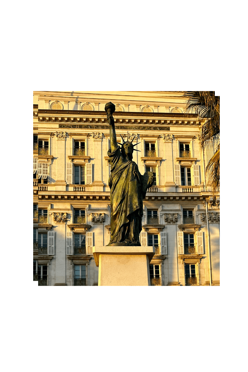 statue of liberty in a sunfilled plaza, signifying strength