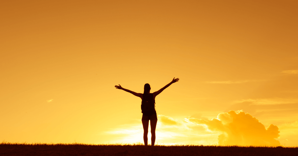 Why Boundaries Are Your Superpower in Recovering from Narcissistic Abuse - A view from the window of an aircraft looking over the wing to the sunrise