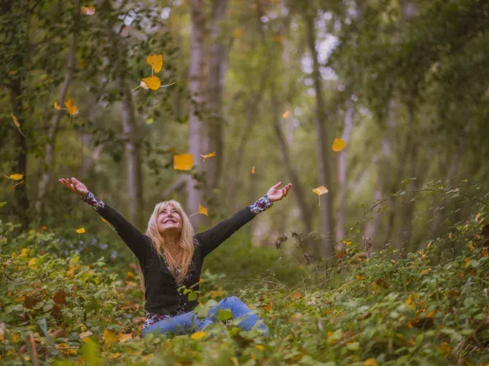 A woman enjoying a quiet wellness moment — symbolizing gut and mood reset