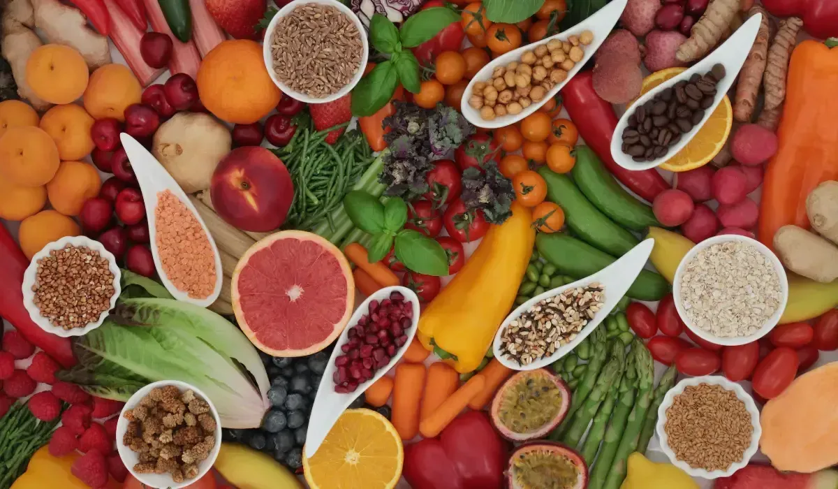 Colorful top-down photo of diverse plant foods used to support gut and immune health naturally.