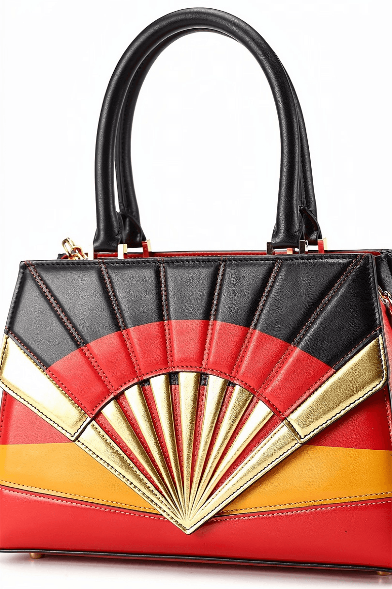 A stylish matchday handbag in black, red and gold with elegant geometric fan‑shaped accents.