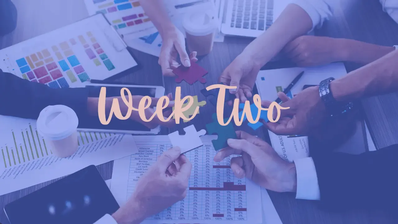 Blue-tinted overhead view of a team assembling puzzle pieces next to data charts with "Week Two" text, representing collaborative development of scalable business growth strategies.
