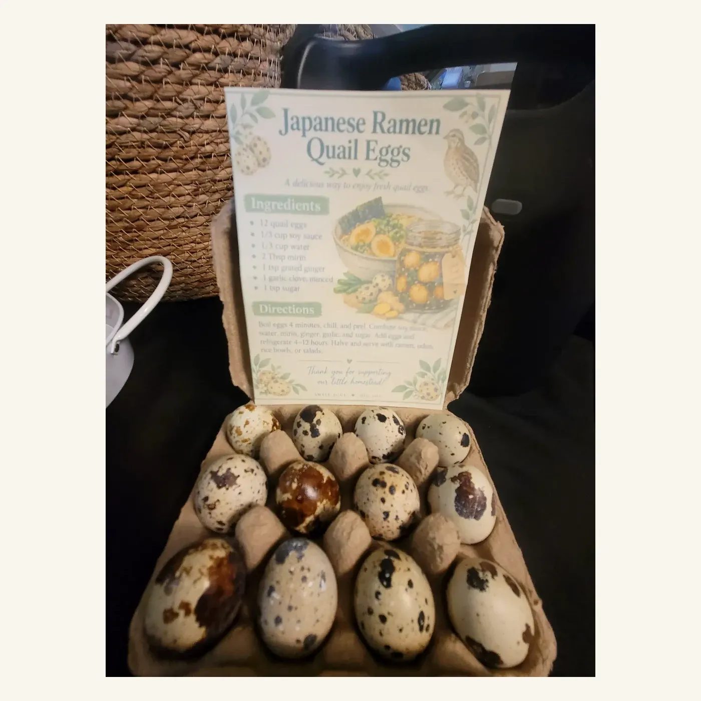 Open carton of fresh Japanese quail eggs