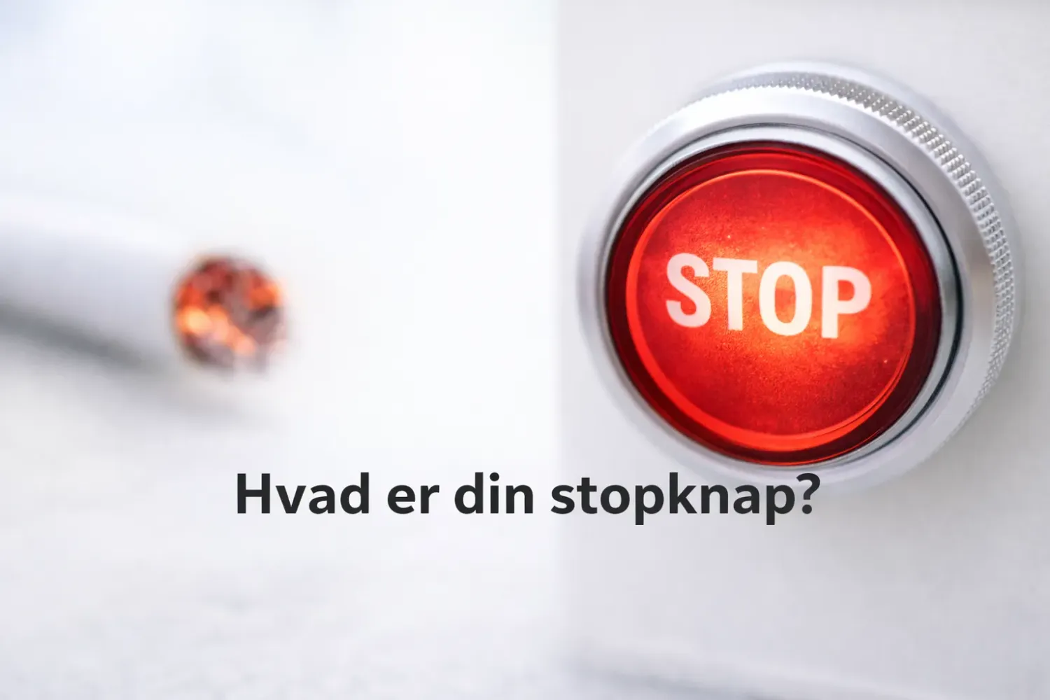 Billedet viser en stop knap og en cigaret