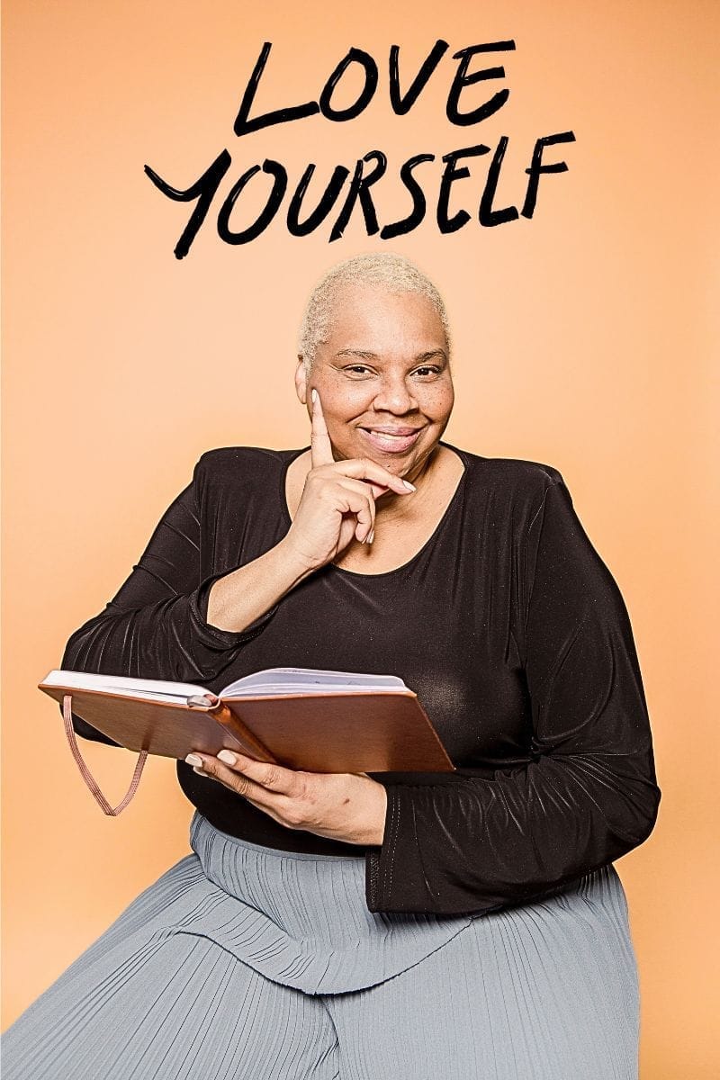 Love Yourself: confident plus size woman with book in hand