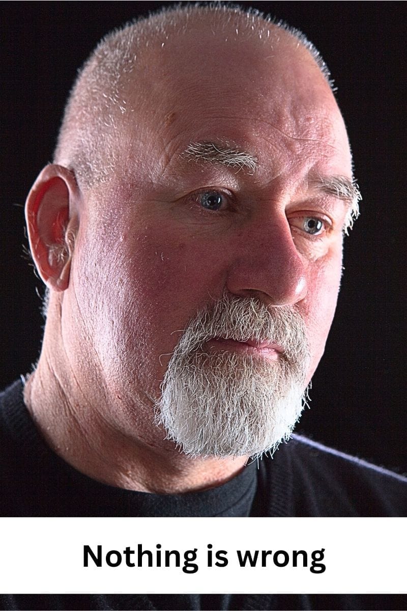 Man looking solemn - body language shows there is something wrong