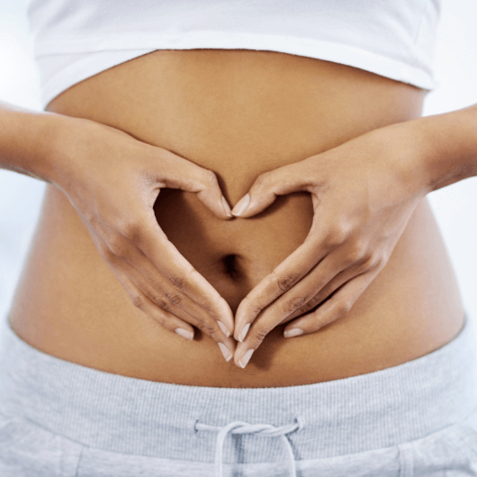 Wildfit is good for your gut health: heart shape hands in front of belly