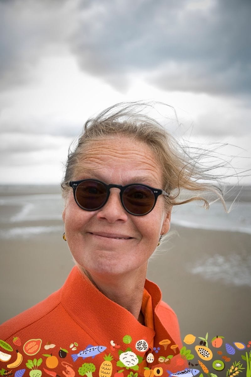 Confident looking woman in blustery weather - wildfit gives immune system a boost