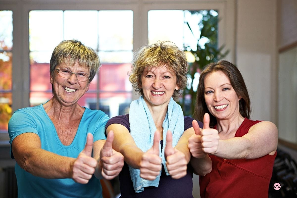 Three women exercising together - building friendships in later life