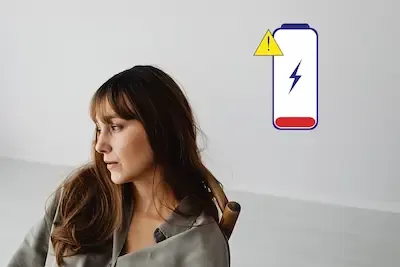 Middle-aged woman looking emotionally drained, illustrating the symptoms of compassion fatigue in caregivers.