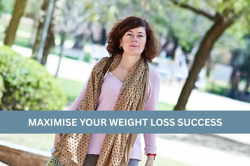 A woman walking in a natural green setting with the caption 'Maximise your weight loss journey' through low-impact exercise.