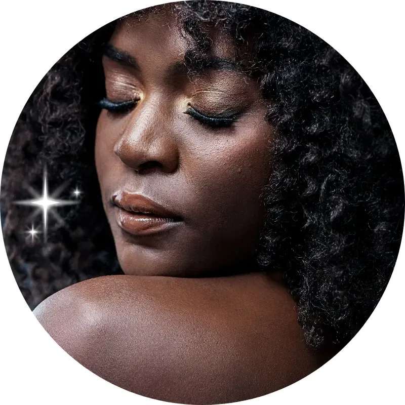 A mature woman sitting peacefully with eyes closed, reflecting internal confidence and emotional healing.