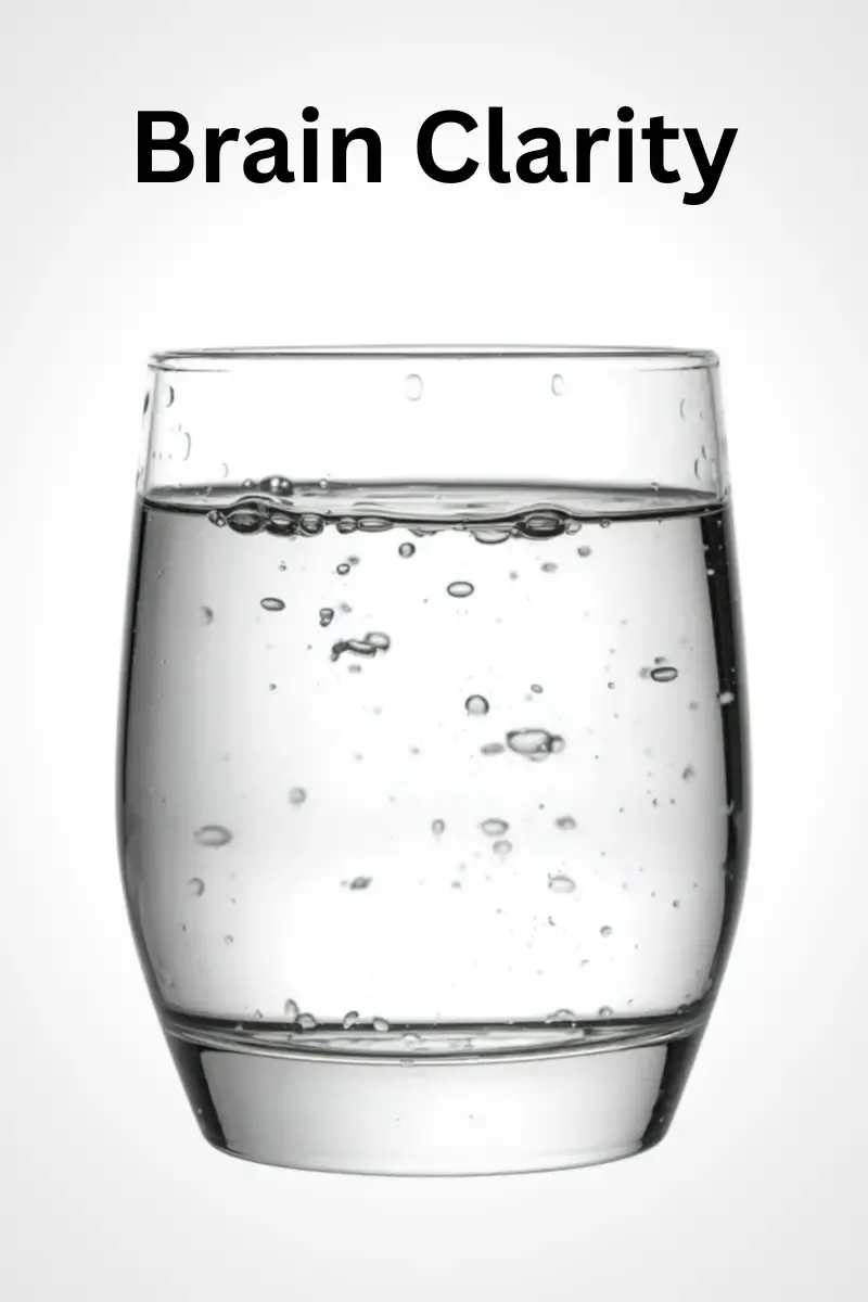 The words Brain Clarity overlaid on a glass of water background, representing hydrating to improve cognitive performance