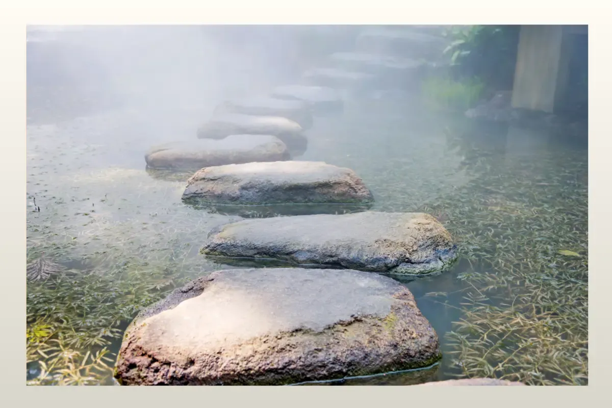 River Stones in ambient surroundings representing kindness over willpower