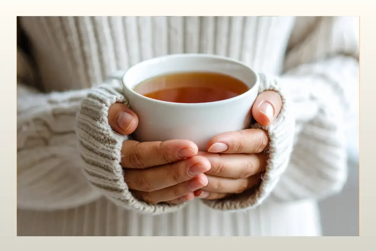 holding a cup of tea representing healing of emotional eating