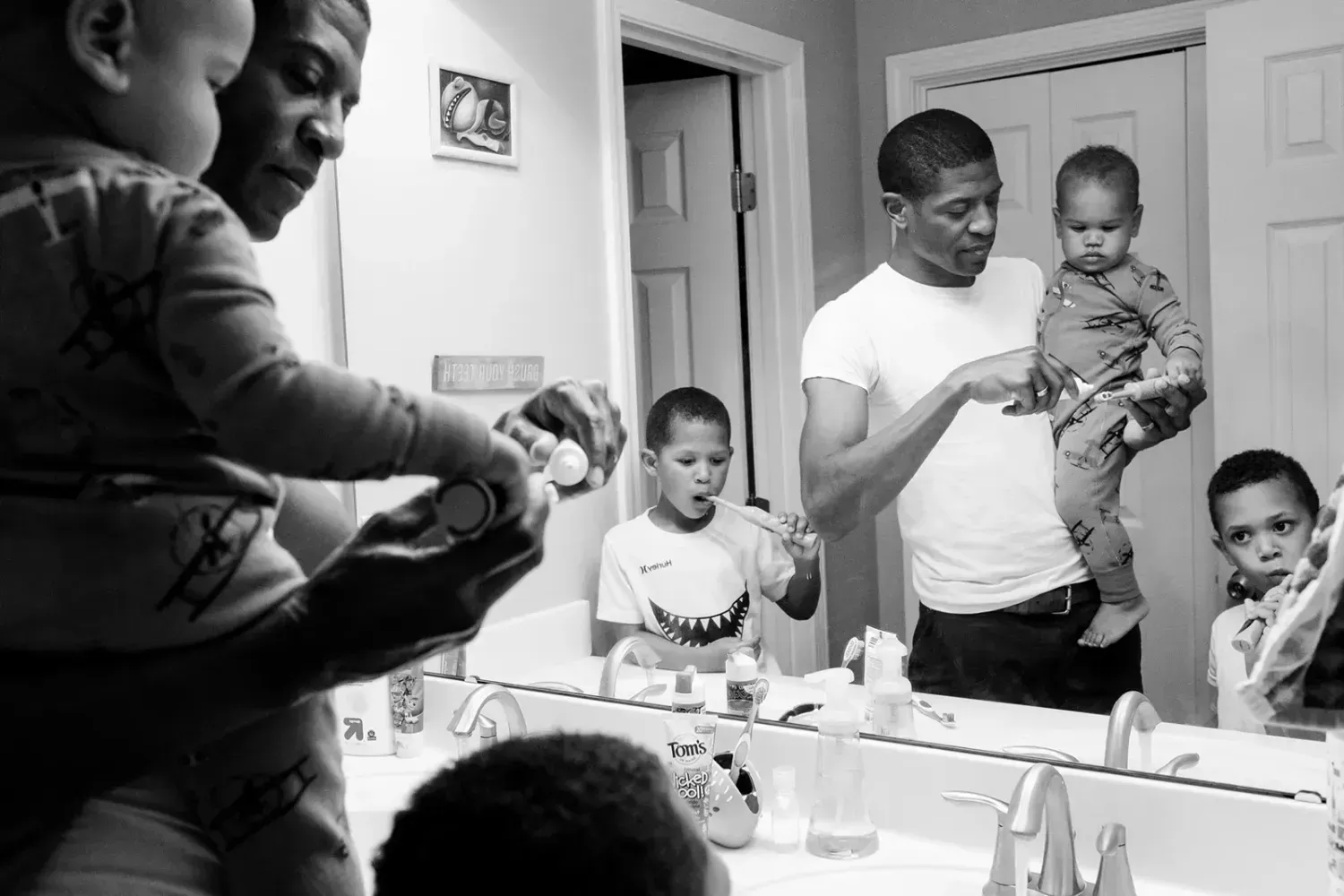 Editorial photos of Black fathers with children.