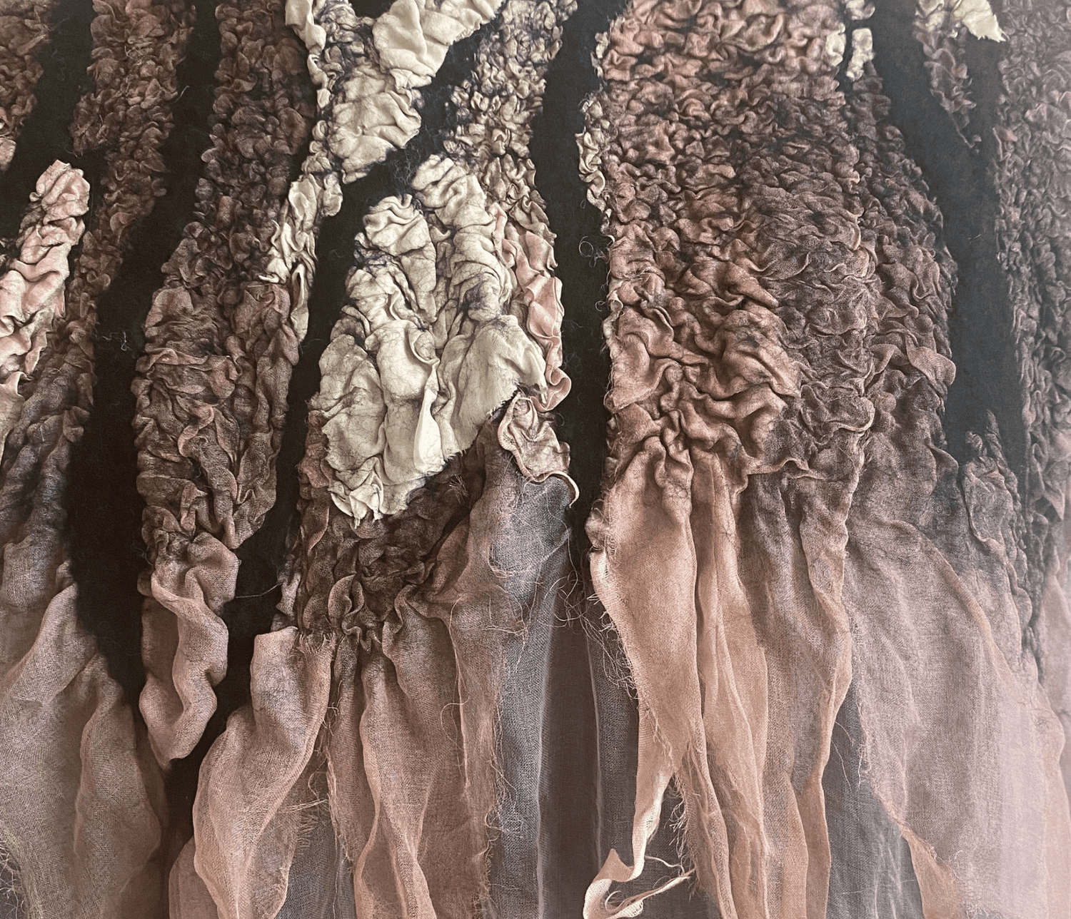 Handmade nuno felt textile with organic texture details