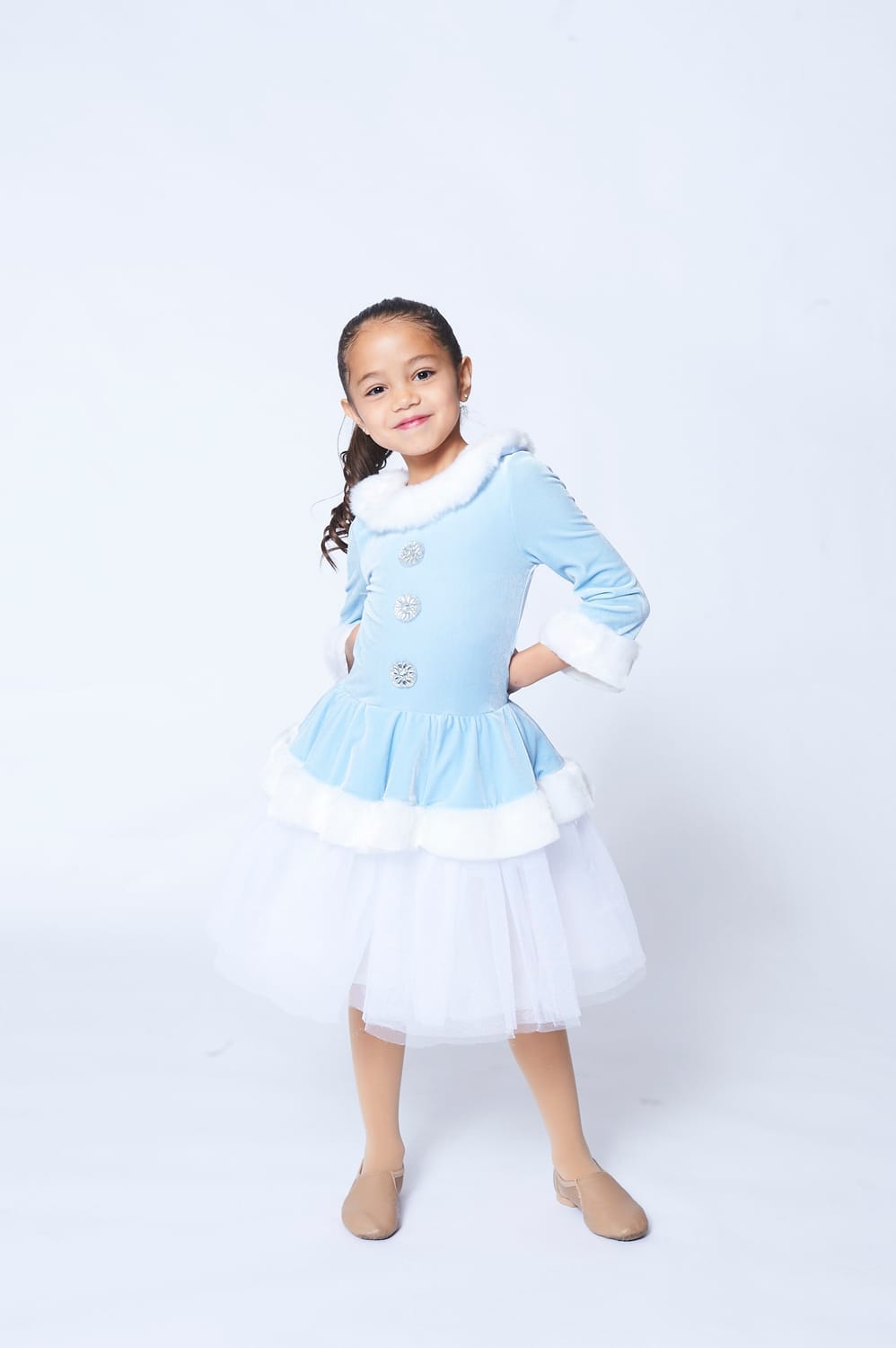 Vanessa Fox in a blue holiday costume during the Christmas Dance Reunion photoshoot