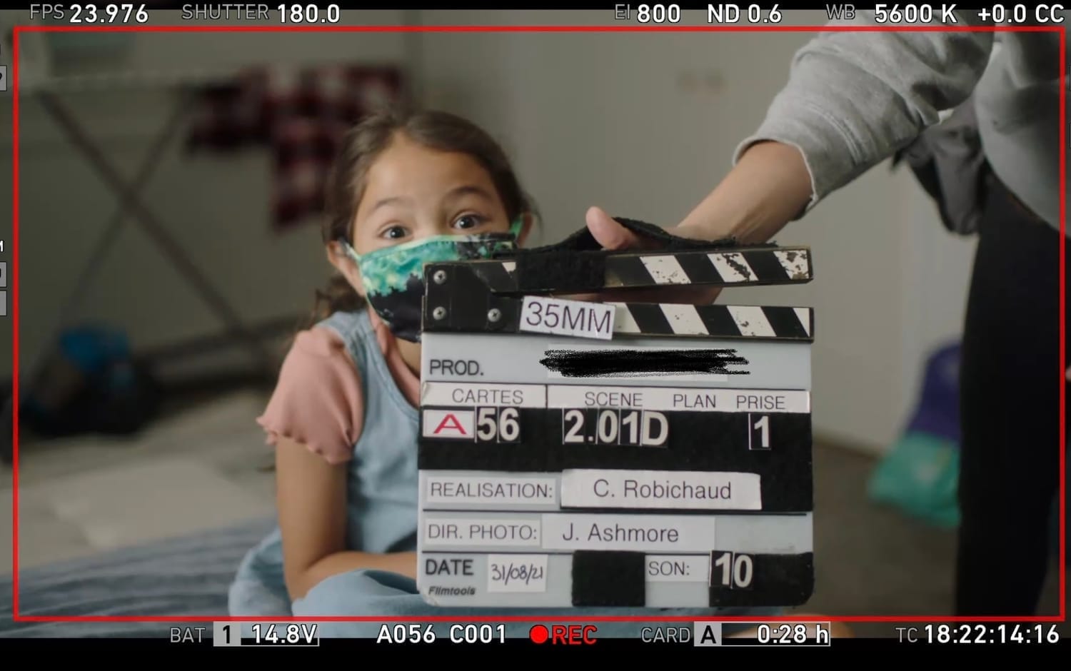 Vanessa Fox behind the film slate board during behind-the-scenes of Pillow Talk.
