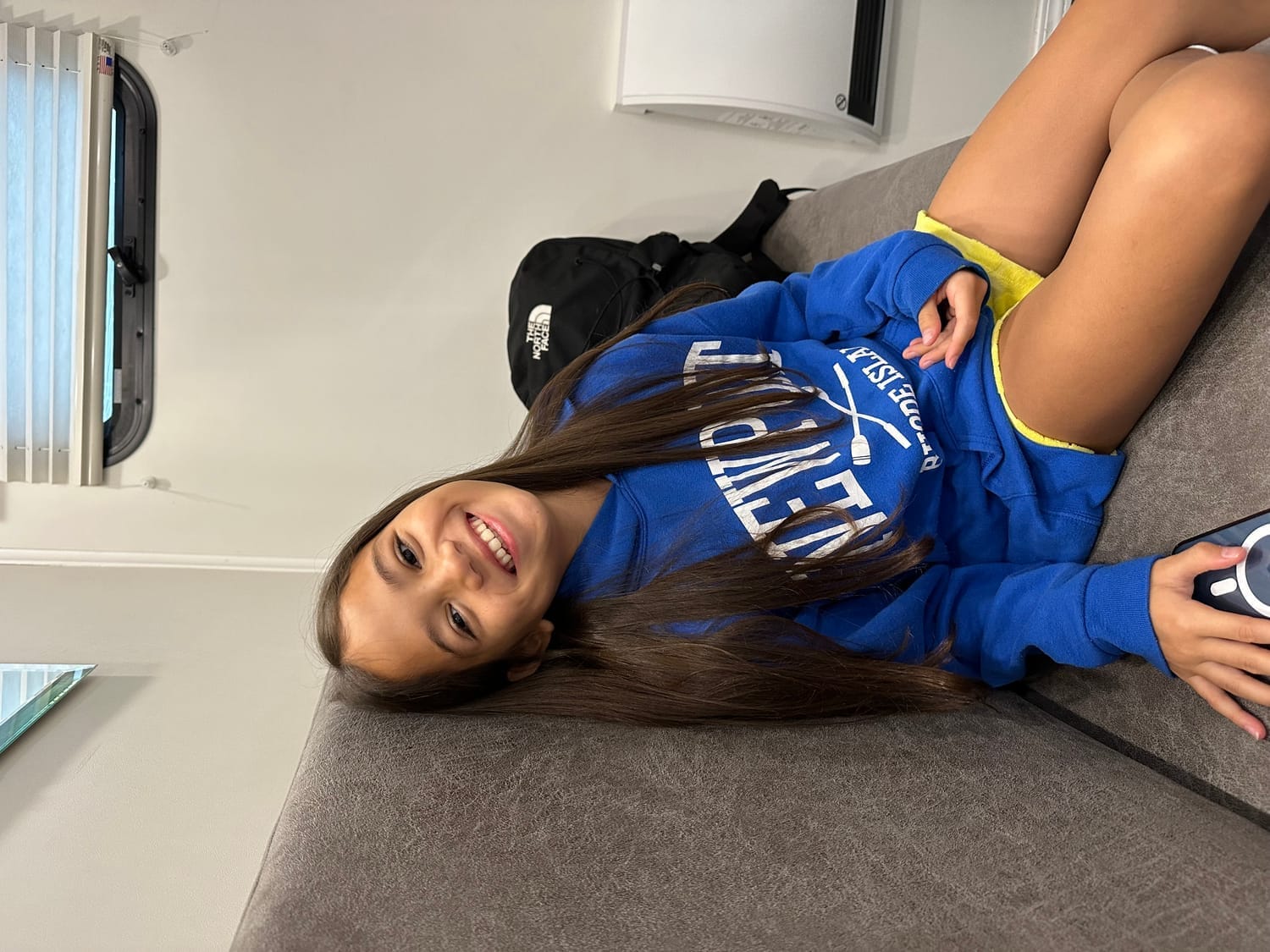 Vanessa Fox smiling inside her trailer on set of Ginny & Georgia.