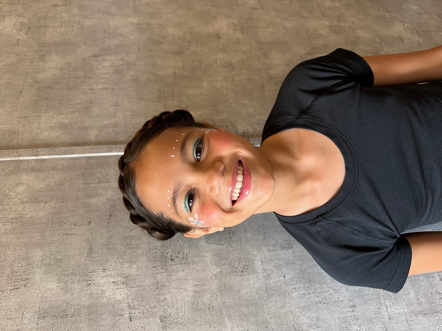 Close-up of Vanessa Fox in stage makeup on set of Murdoch Mysteries.
