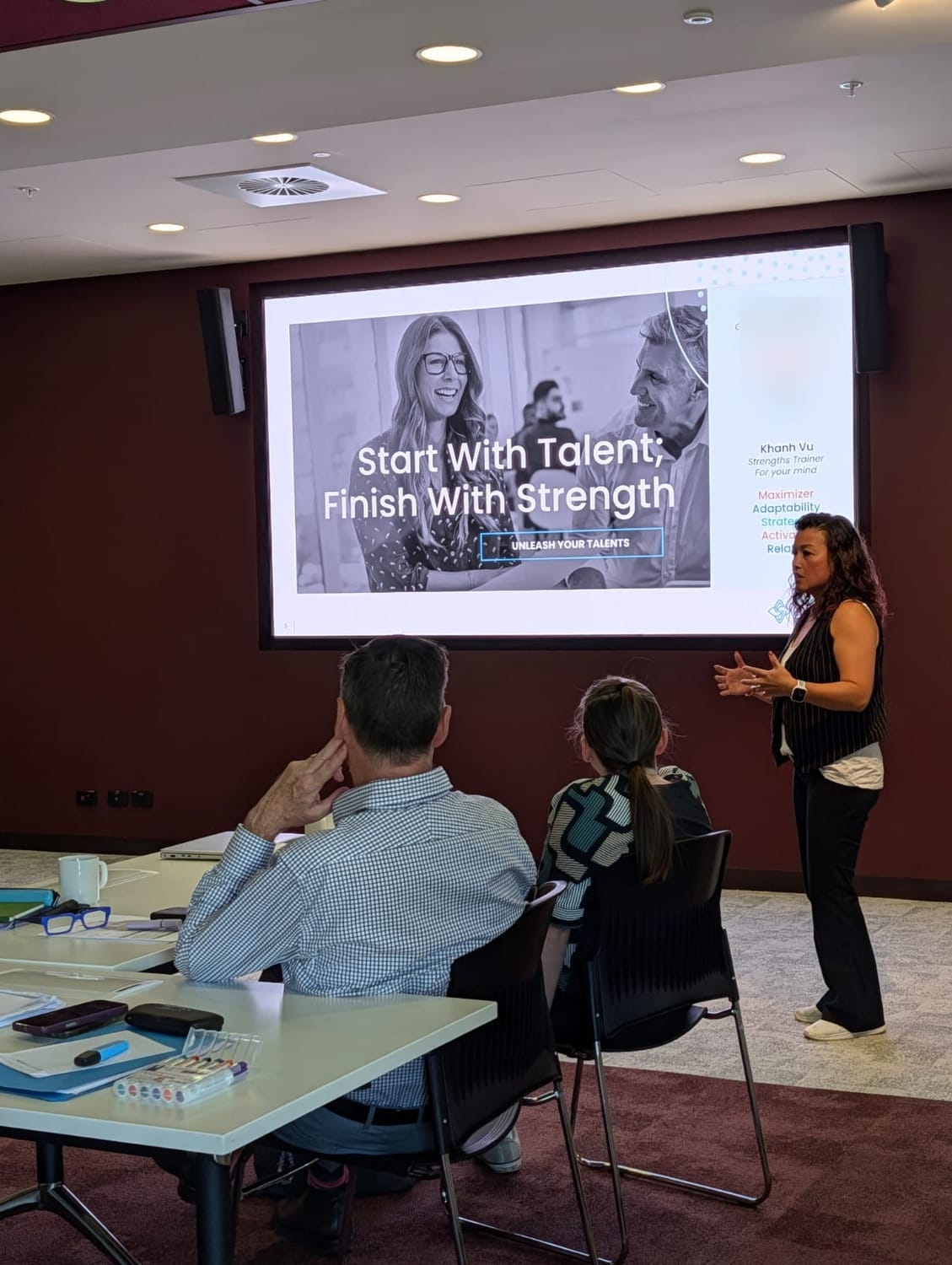 Khanh Vu facilitating a CliftonStrengths workshop session