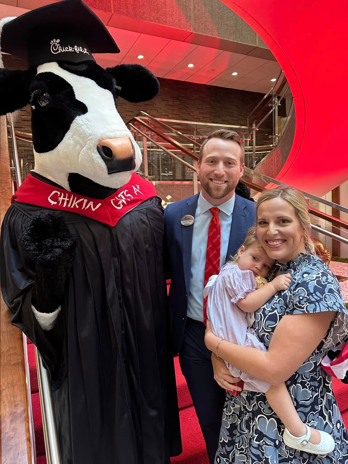 Brandon Powell with family and mascot